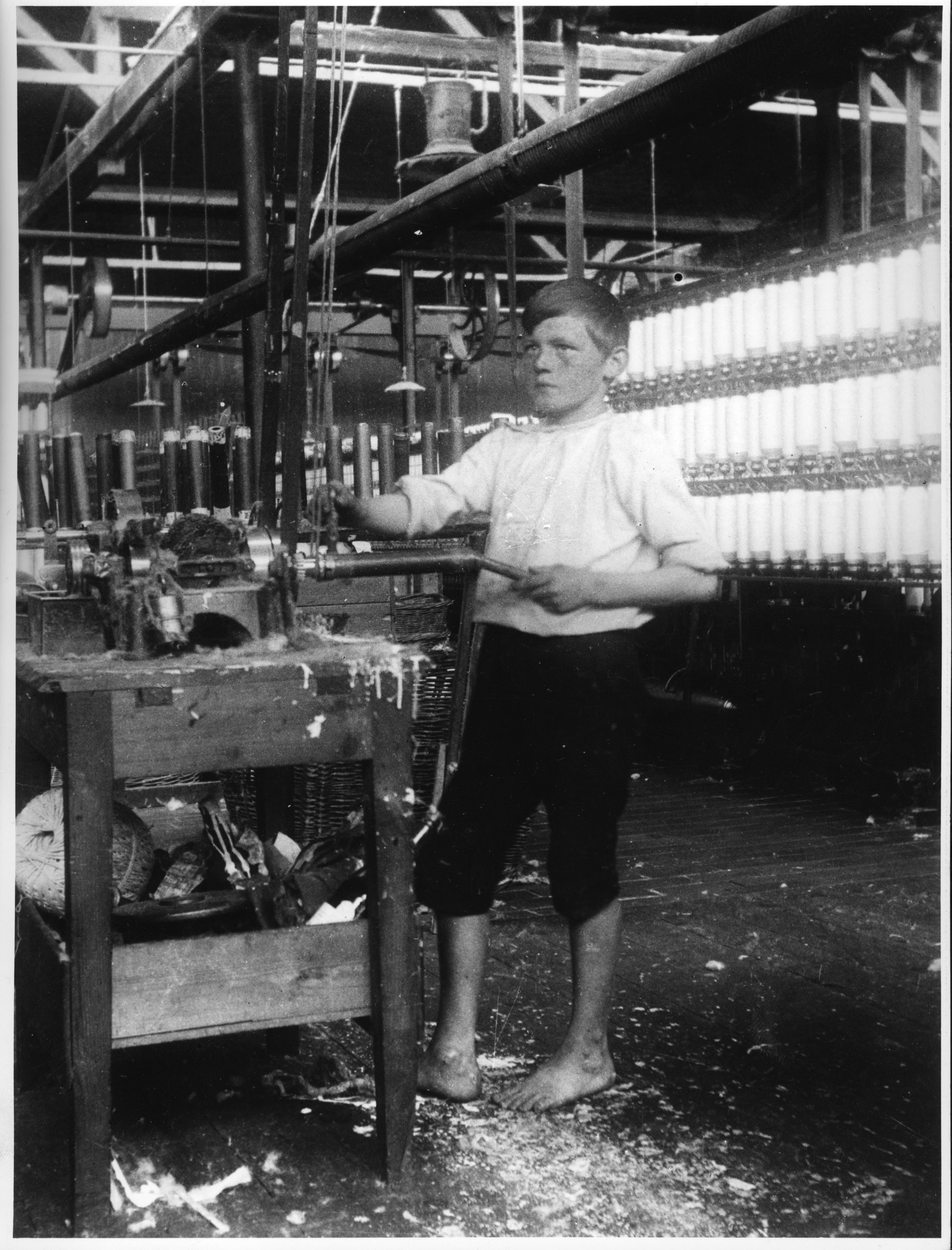 Arbejdsdreng på bomuldsfabrikken